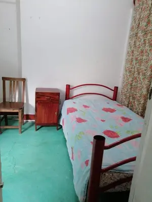 Cama o camas de una habitación en Caracas