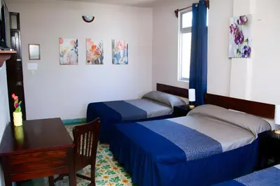 Cama o camas de una habitación en Hotel Cortaza Galería