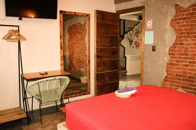Cama o camas de una habitación en Casa Flora Handmade Hotel