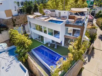 Piscina en o cerca de LUXO Casa en Acapulco Zona Brisas Guitarrón con vistas espectaculares y 2 albercas