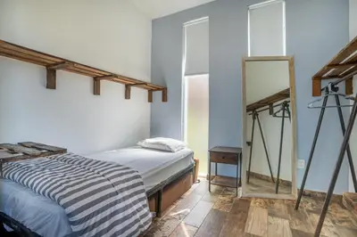 Cama o camas de una habitación en LUXO Casa en Acapulco Zona Brisas Guitarrón con vistas espectaculares y 2 albercas