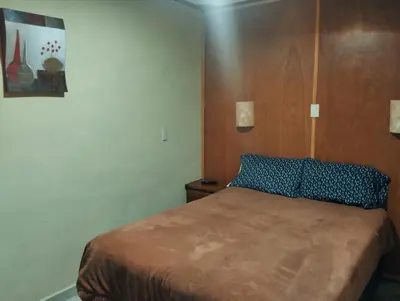 Cama o camas de una habitación en Hotel Nikko