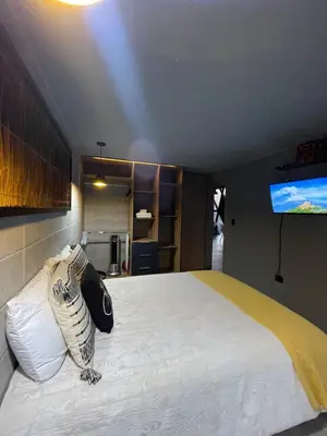Cama o camas de una habitación en Loft industrial vista a los volcanes