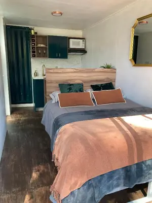 Cama o camas de una habitación en ZACATLAN CONTENEDORES