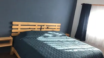 Cama o camas de una habitación en Hostal Casa Flor de Limón