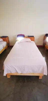Cama o camas de una habitación en Nomada Hostel Oaxaca - Vive nómada!