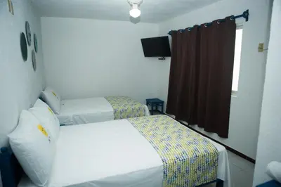 Cama o camas de una habitación en HOTEL INTI