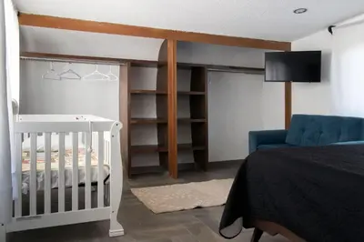 Cama o camas de una habitación en Casa las Maravillas, hermosos jardines y alberca