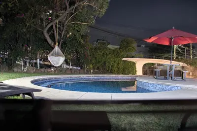 Piscina en o cerca de Casa las Maravillas, hermosos jardines y alberca