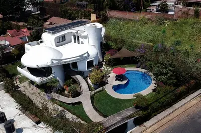 Piscina en o cerca de Casa las Maravillas, hermosos jardines y alberca
