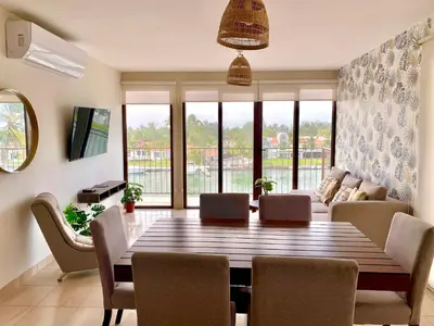 Una televisión o centro de entretenimiento en Vista al mar, Alberca, Netflix, Playa - Facturamos