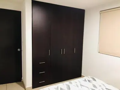 Cama o camas de una habitación en Tu refugio en CDMX cerca del Foro Sol y del AICM