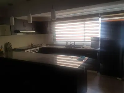 Una cocina o zona de cocina en Departamento en Zona Dorada de Acapulco