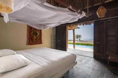 Cama o camas de una habitación en Oceanfront Casa Rhino