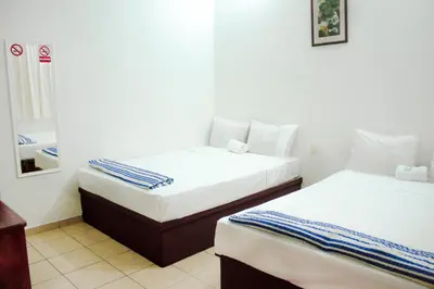 Cama o camas de una habitación en Hotel OM DownTown