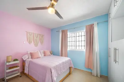 Cama o camas de una habitación en 3BR Casa familiar con alberca y asador en Oaxtepec