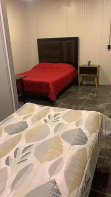 Cama o camas de una habitación en Suite Aries