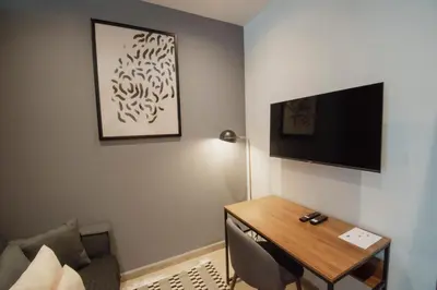 Una televisión o centro de entretenimiento en Punto Lofts Periférico Sur