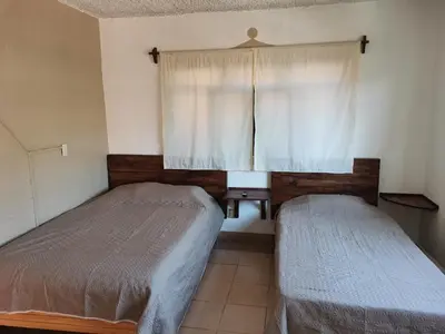 Cama o camas de una habitación en Azomalli