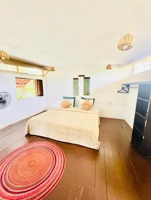Cama o camas de una habitación en El Eden Escondido
