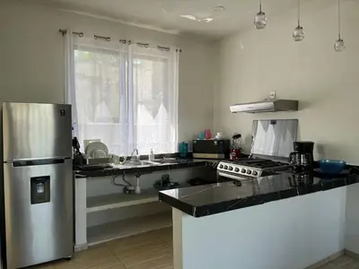 Una cocina o zona de cocina en Departamento Marsopas a 5 minutos a pie de Bahía Carrizalillo!!! 3