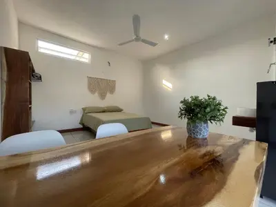Una televisión o centro de entretenimiento en Casa Mura