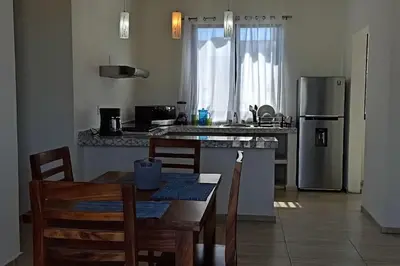 Una cocina o zona de cocina en Departamento Marsopas a 5 minutos a pie de Bahía Carrizalillo!!! 1