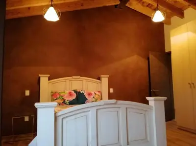 Cama o camas de una habitación en Departamento Lux En Val’Quirico Loft Frontana