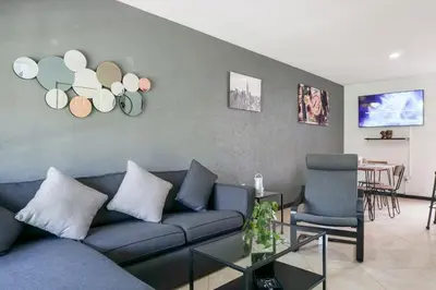Una televisión o centro de entretenimiento en Bella Residencial Arco Antiguo Yautepec