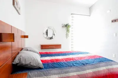 Cama o camas de una habitación en Bella Residencial Arco Antiguo Yautepec