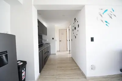 Una cocina o zona de cocina en Departamento en Condominio Astoria