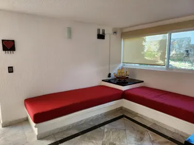 Cama o camas de una habitación en Secretos del Sol Acapulco villas a 5 minutosdel mar