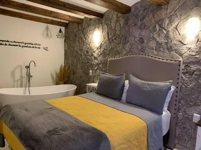 Cama o camas de una habitación en Hermoso departamento en Val’Quirico Loft Frontana