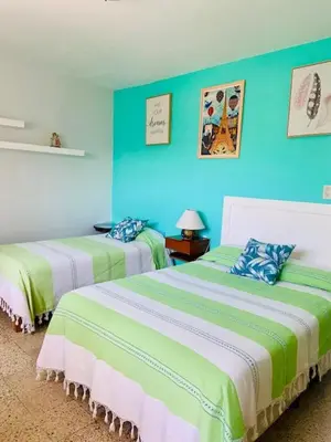 Cama o camas de una habitación en CASA JOAQUÍN HOSTAL