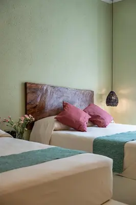 Cama o camas de una habitación en Hotel Bindani’
