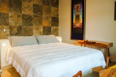 Cama o camas de una habitación en Hotel Casa Justina