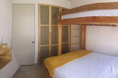 Cama o camas de una habitación en Dafi´s House (Exclusivo con jardín)