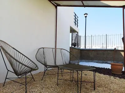 Un balcón o terraza de Dafi´s House (Exclusivo con jardín)