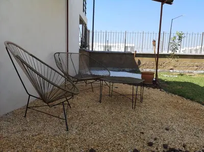 Un balcón o terraza de Dafi´s House (Exclusivo con jardín)