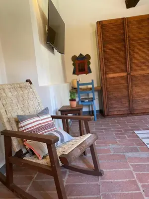 Una televisión o centro de entretenimiento en Casa Paraiso San Pablo