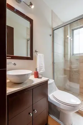 Un baño de Urban Classic CDMX 2BD 4PAX// Céntrico con balcón