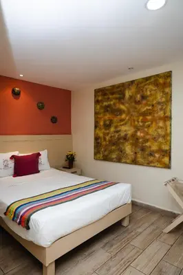 Cama o camas de una habitación en Hotel El Andariego
