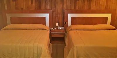 Cama o camas de una habitación en Hotel Finisterre