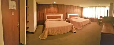 Cama o camas de una habitación en Hotel Finisterre