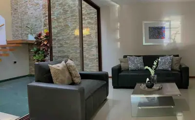 Zona de estar de Casa Palmeras