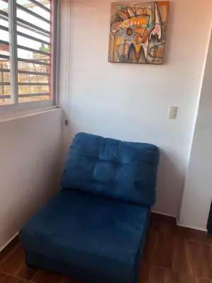 Zona de estar de Departamento Zeus 12